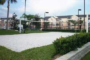 Beach/Sand Volley Ball Court with condos in background