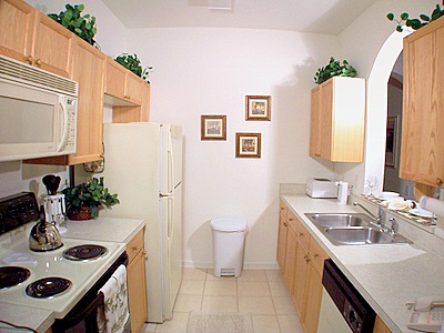 Kitchen viewed from entry foyer of K's Butterfly at Windsor Palms Resort