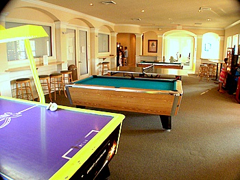 Large central entertainment room leading to other entertainment rooms
