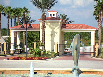 View from dolphin fountain looking out main security gate at Emerald Island Resort